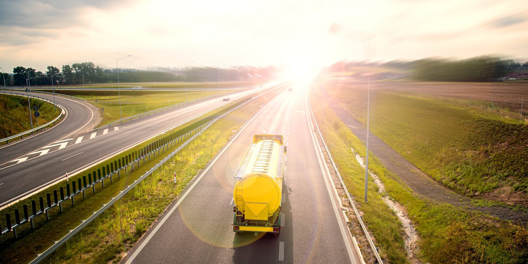 A big fuel tanker truck ,  on the roads of Europe . Logistics and transportation